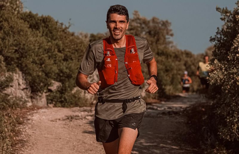 Person in mid-motion during a fluid cardio exercise.